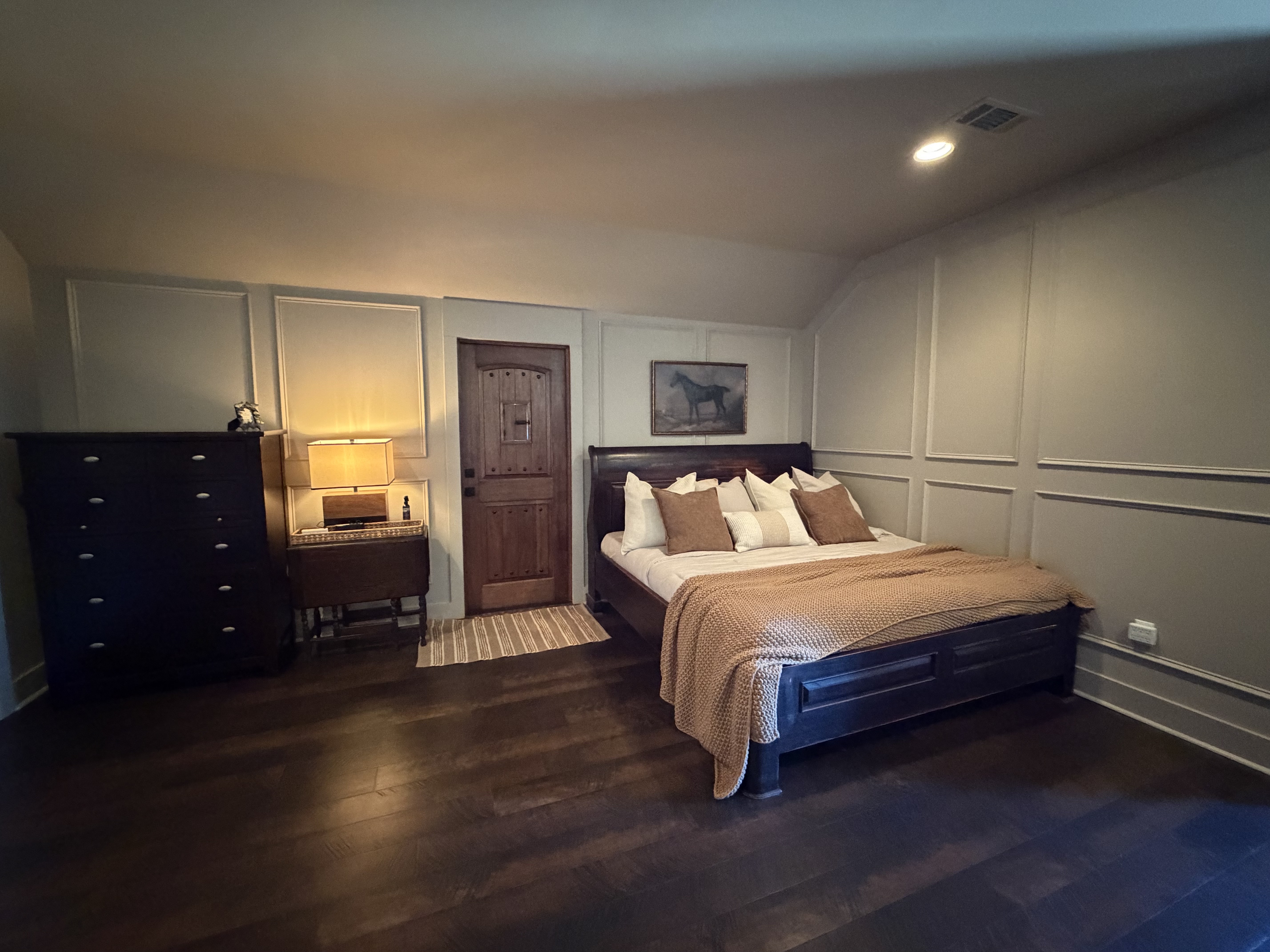 A wedding kiss shared on the sunset peninsula by the waterfront of a modern, southern wedding venue in close proximity to New Orleans and the Northshore.