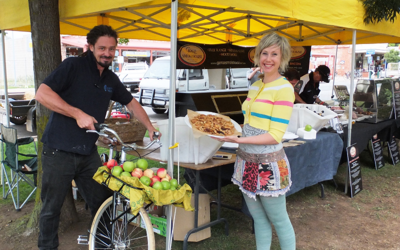 Widowed mum Claire Hoffman pictured with her late husband Garryn, at work at their organic grocery and smoothie bar.