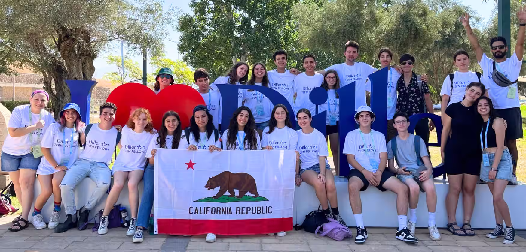 Group photo at Jewish Community Center, holding California flag, History Jewish Community Center Westside JCC now J Los Angeles.