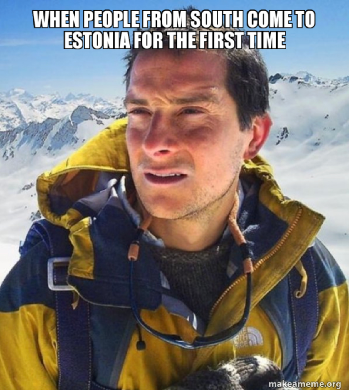 A meme showing a man bundled in winter gear on a snowy mountain.