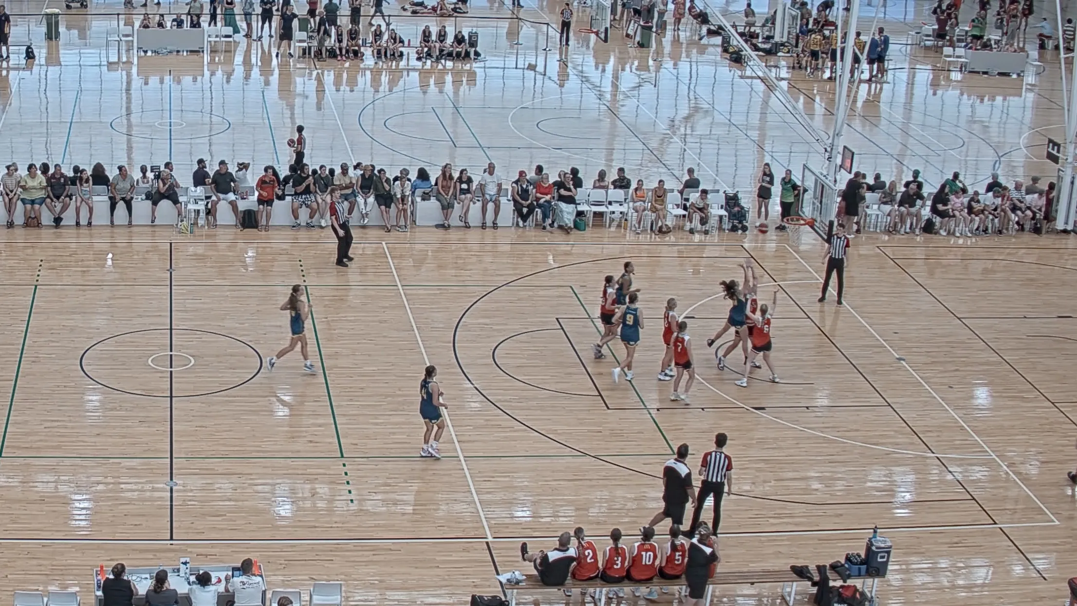 Basketball game play captured by Glory League video platform with highlights and stats