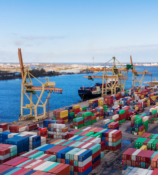 Aerial view of container terminal at the Port of Riga, Latvia with stacked shipping containers and cargo cranes (Baltic sea freight)