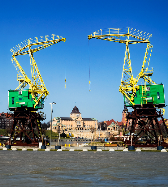Port cranes in Szczecin, Poland with Wały Chrobrego waterfront in the background (Szczecin–Świnoujście shipping port)