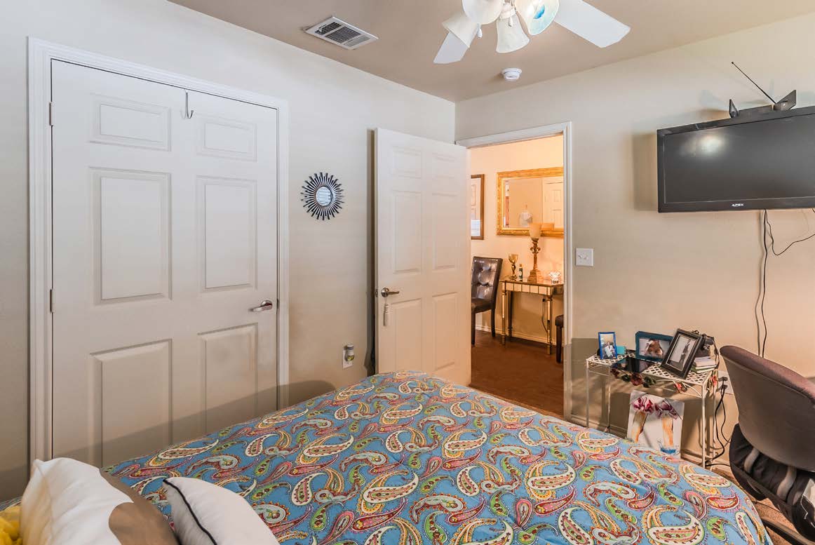 Bedroom with bed and tv