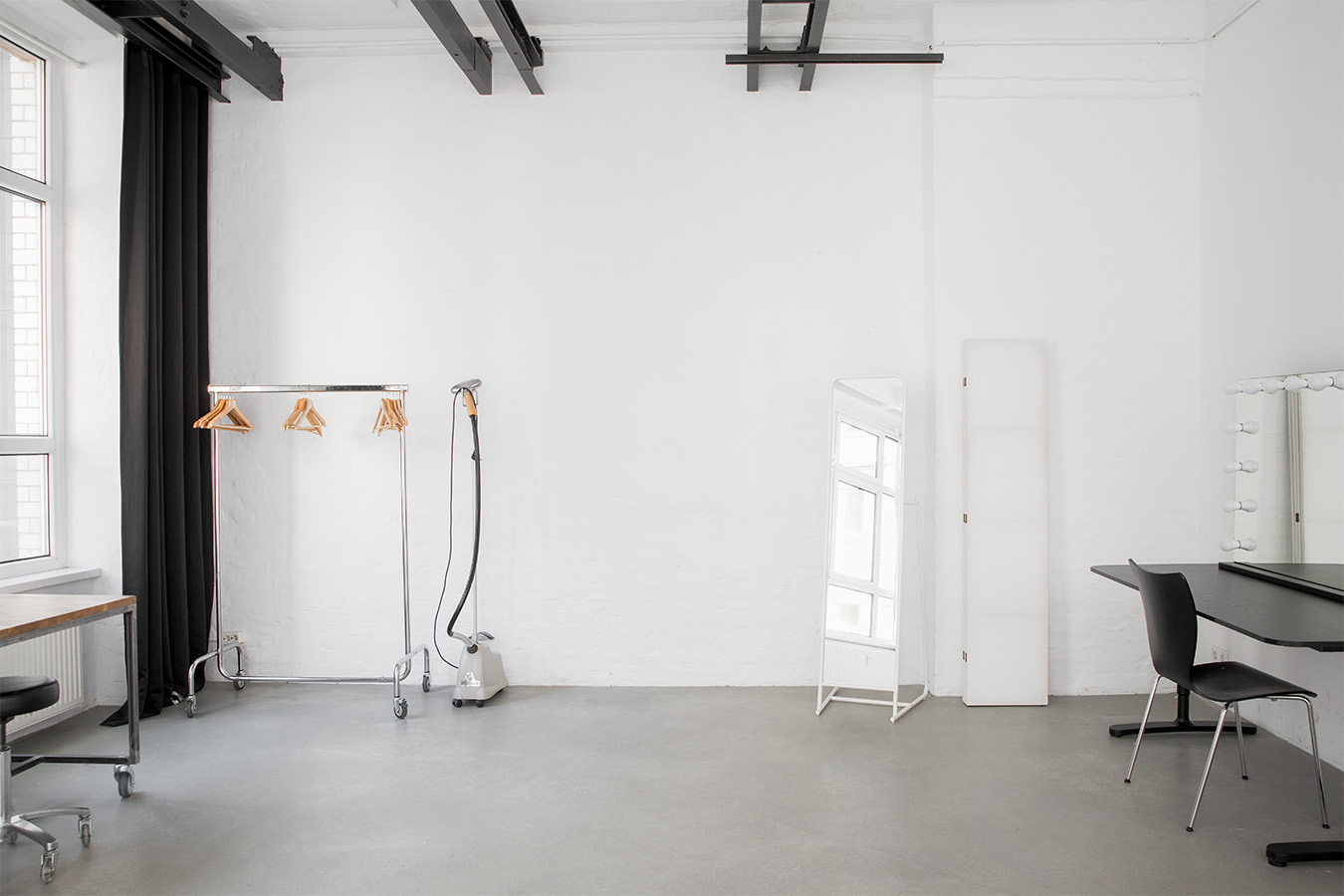 Styling and dressing area in Studio 2 with Japanese folding screen, mirror, clothing rail, steamer and work desk