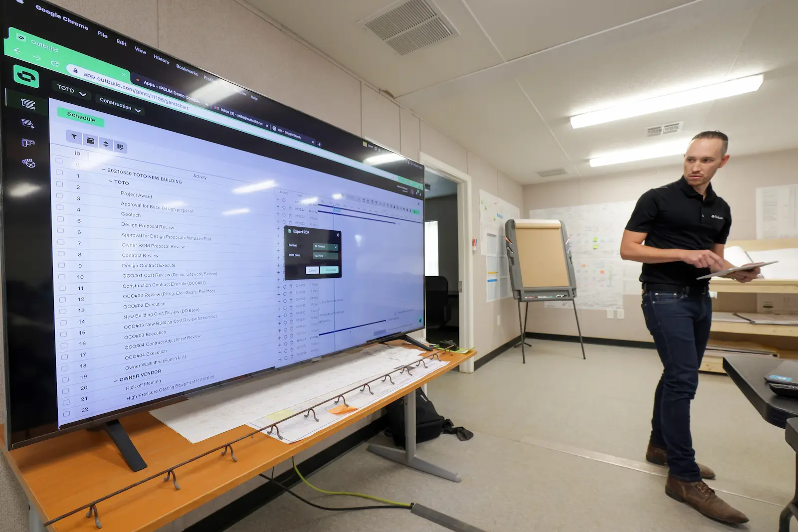 Mike Wong using Outbuild's construction scheduling software