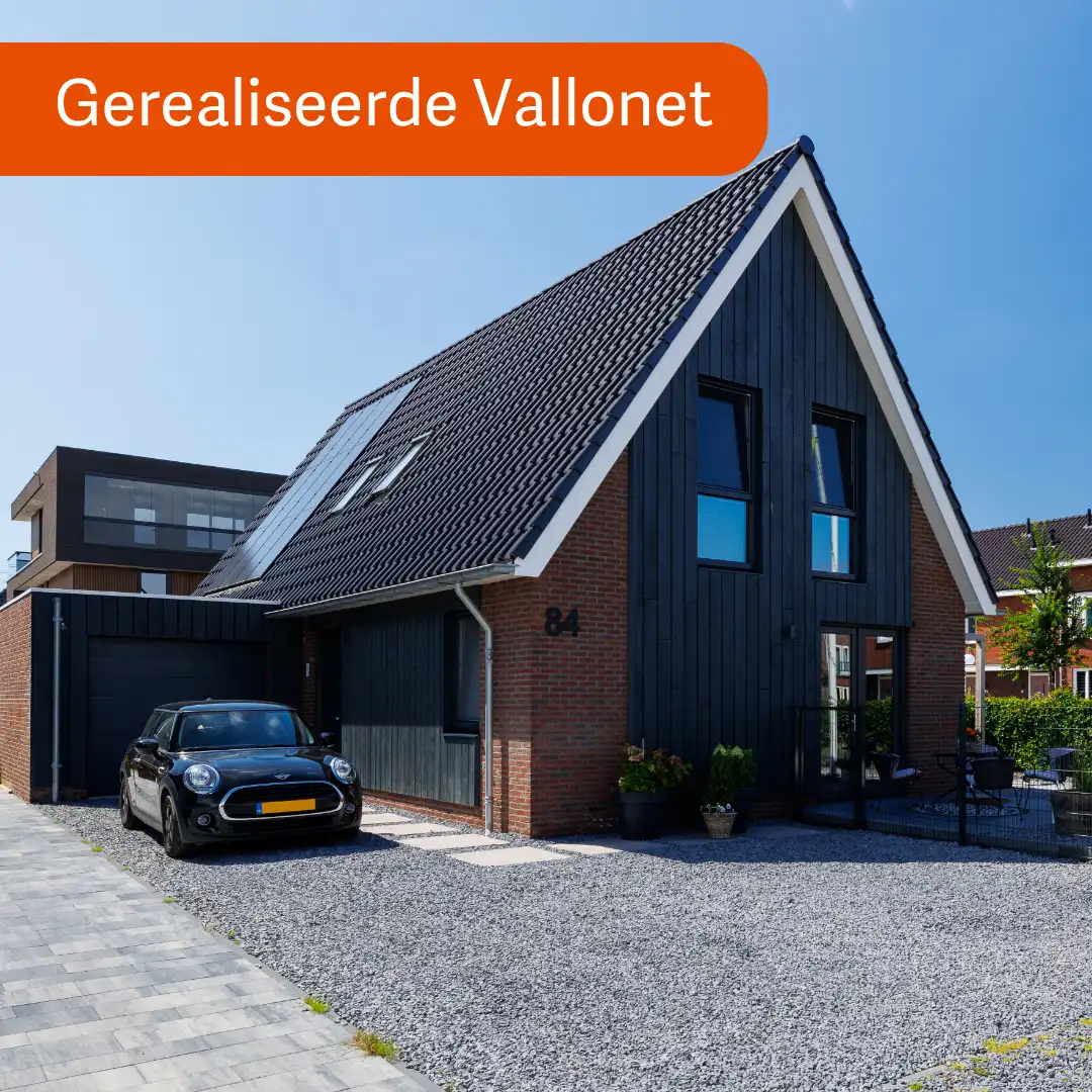 Vrijstaande woning met houtengevelbekleding en rode stenen