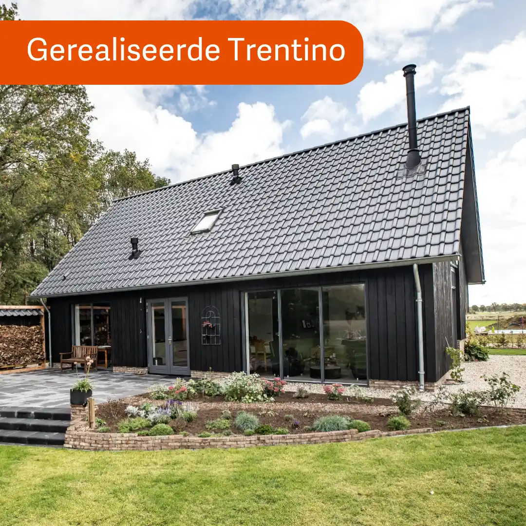 vrijstaande schuurwoning met hoge schoorsteen