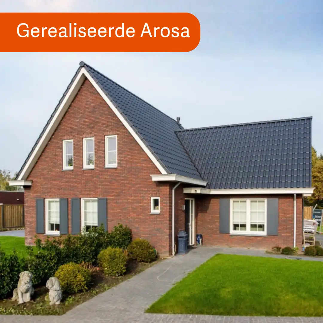 Vrijstaande woning met aanbouw en rode gevelstenen