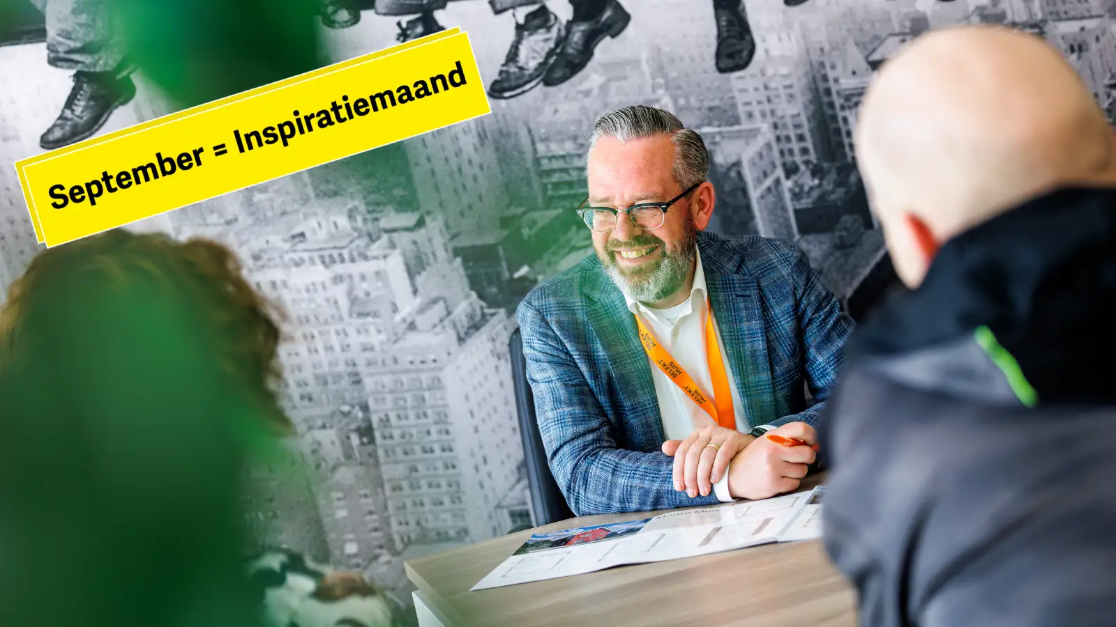 Een lachende medewerker van SelektHuis