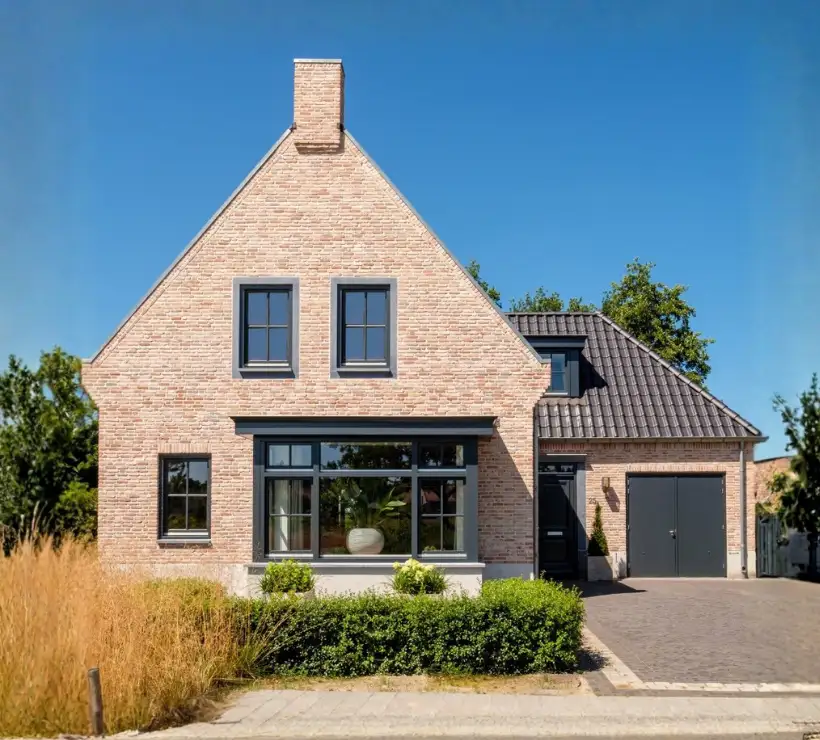 Vrijstaande cottage woning met aanbouw