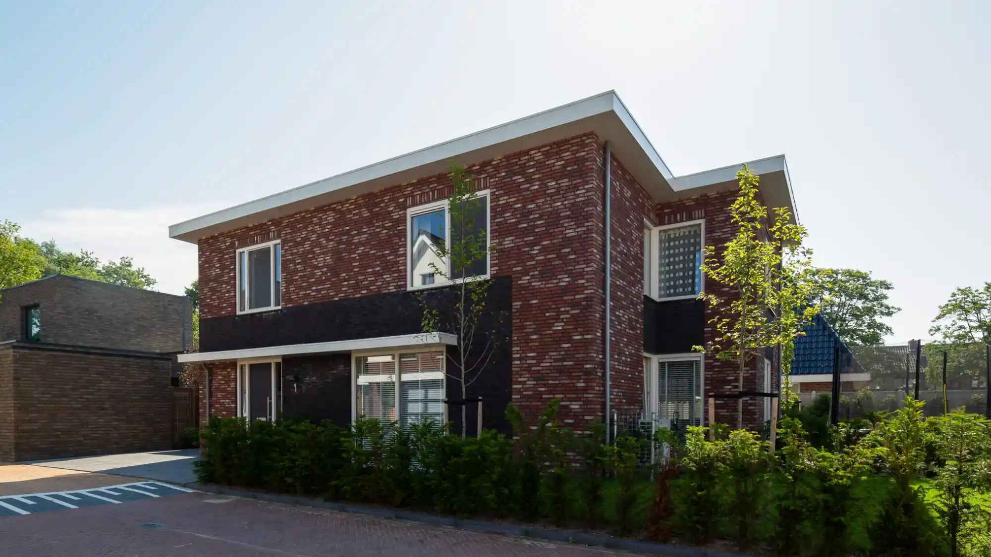 Vrijstaande kubistische woning met plat dak