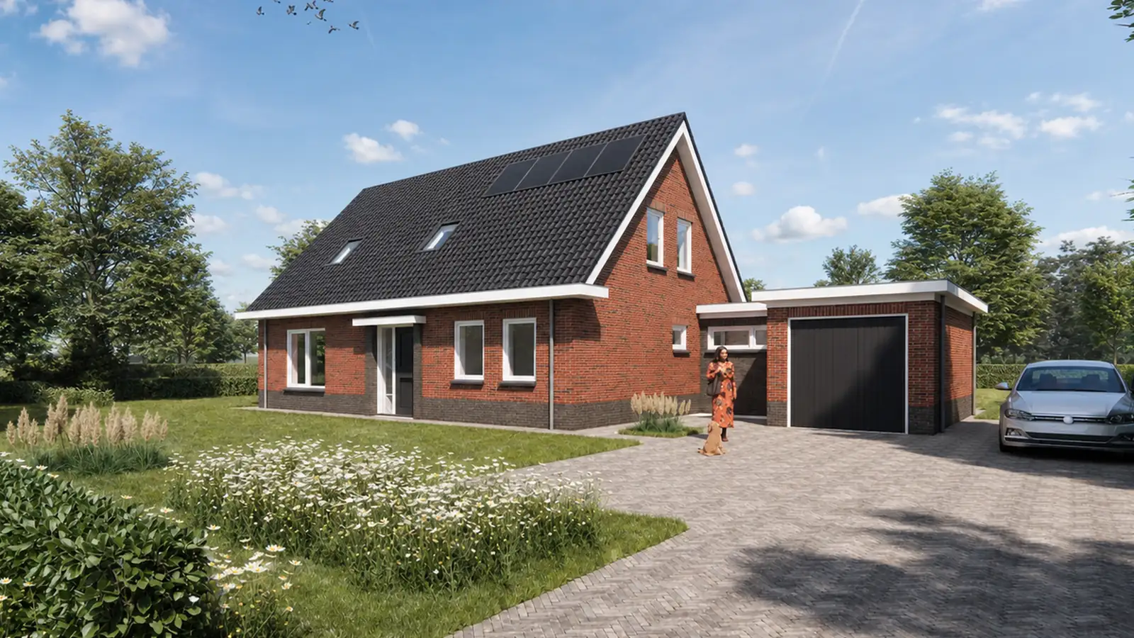 Vrijstaande woning met rode gevelstenen en aangebouwde garage