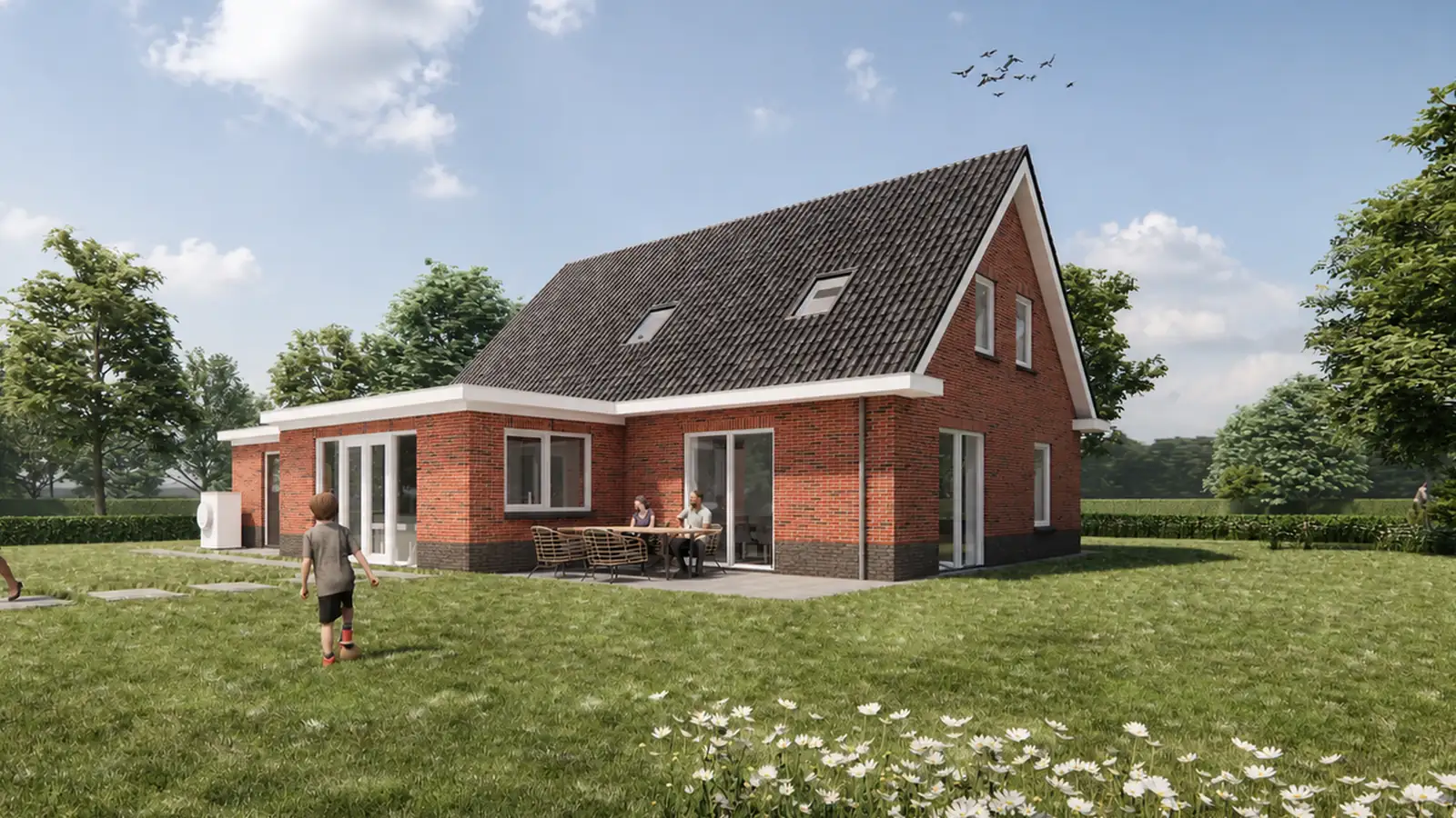 Vrijstaande woning met rode gevelstenen en uitbouw met openslaande deuren