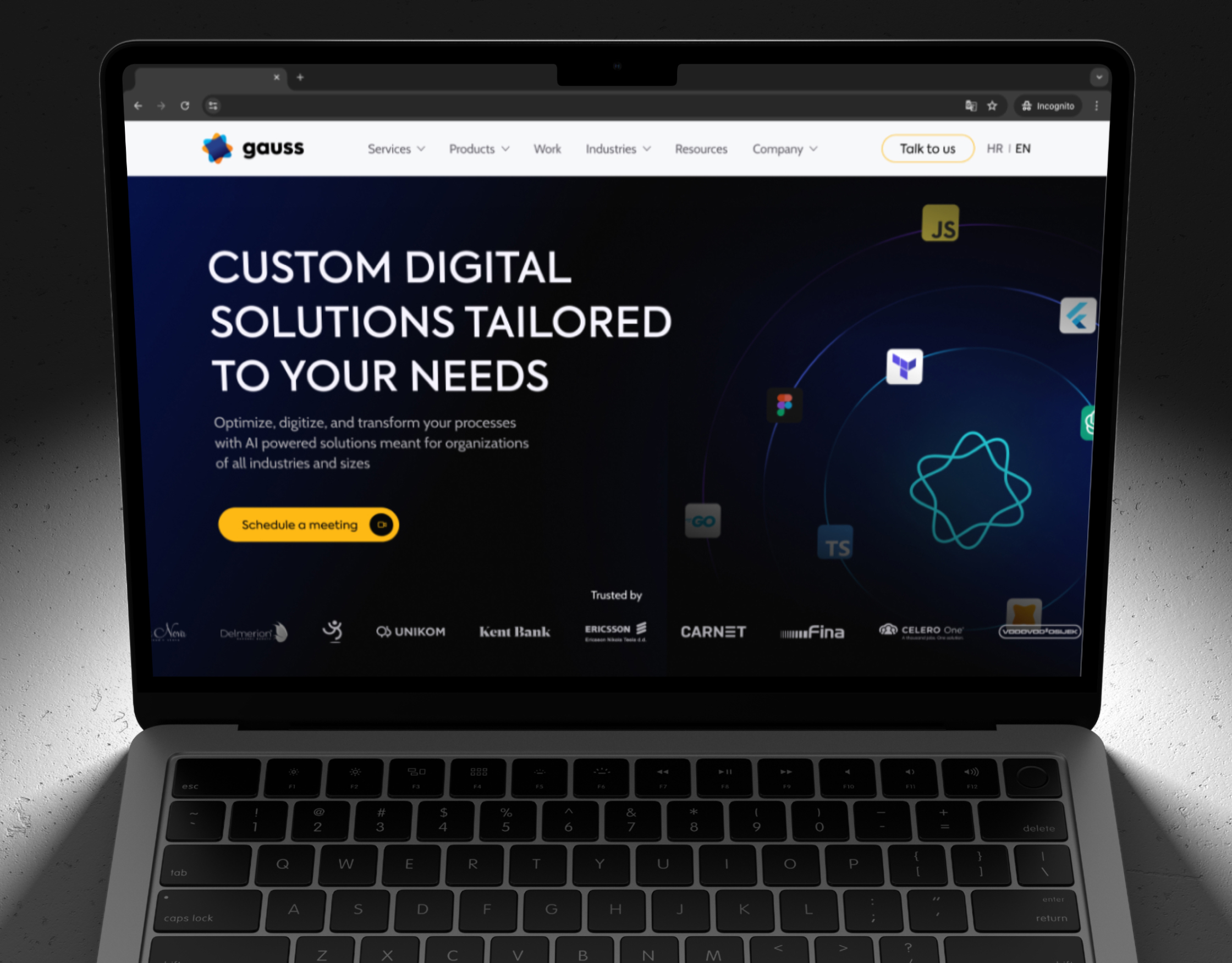 Gauss homepage shown on a laptop mockup, with the dark hero and a ring of technology logos