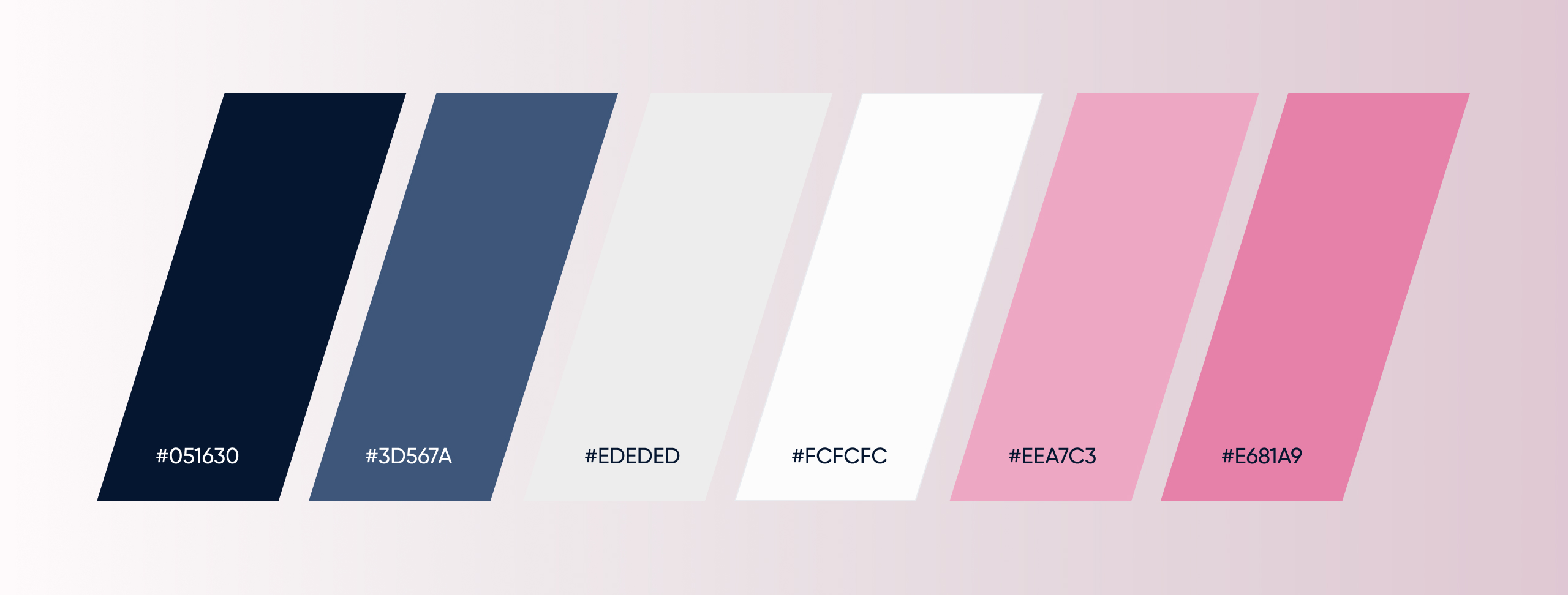 One of 8 colour palette of slanted swatches in navy, slate blue, greys and two pinks, each labelled with its hex value
