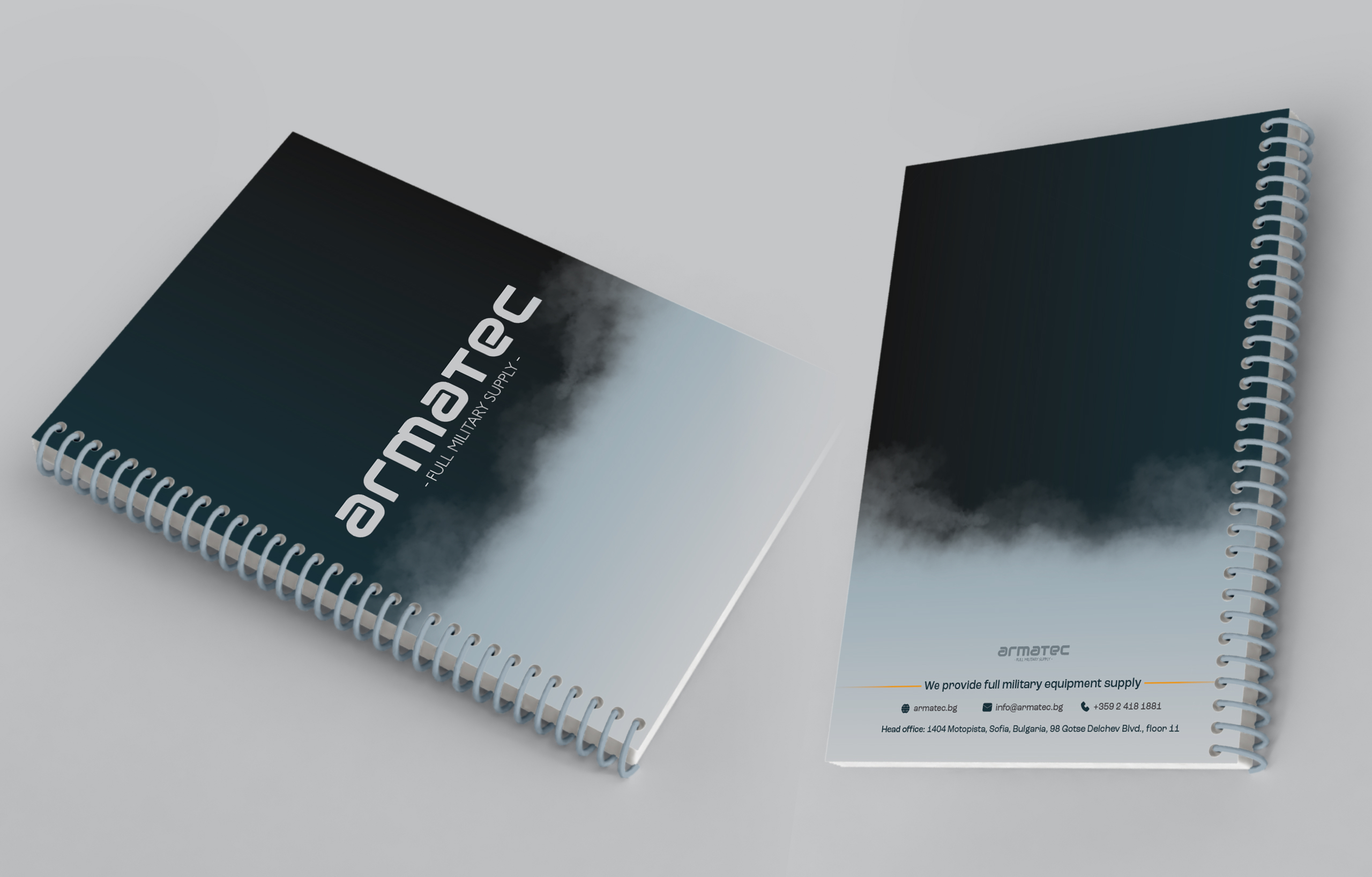 Armatec spiral-bound notebooks with the logo on a smoke-gradient cover and contact details on the back