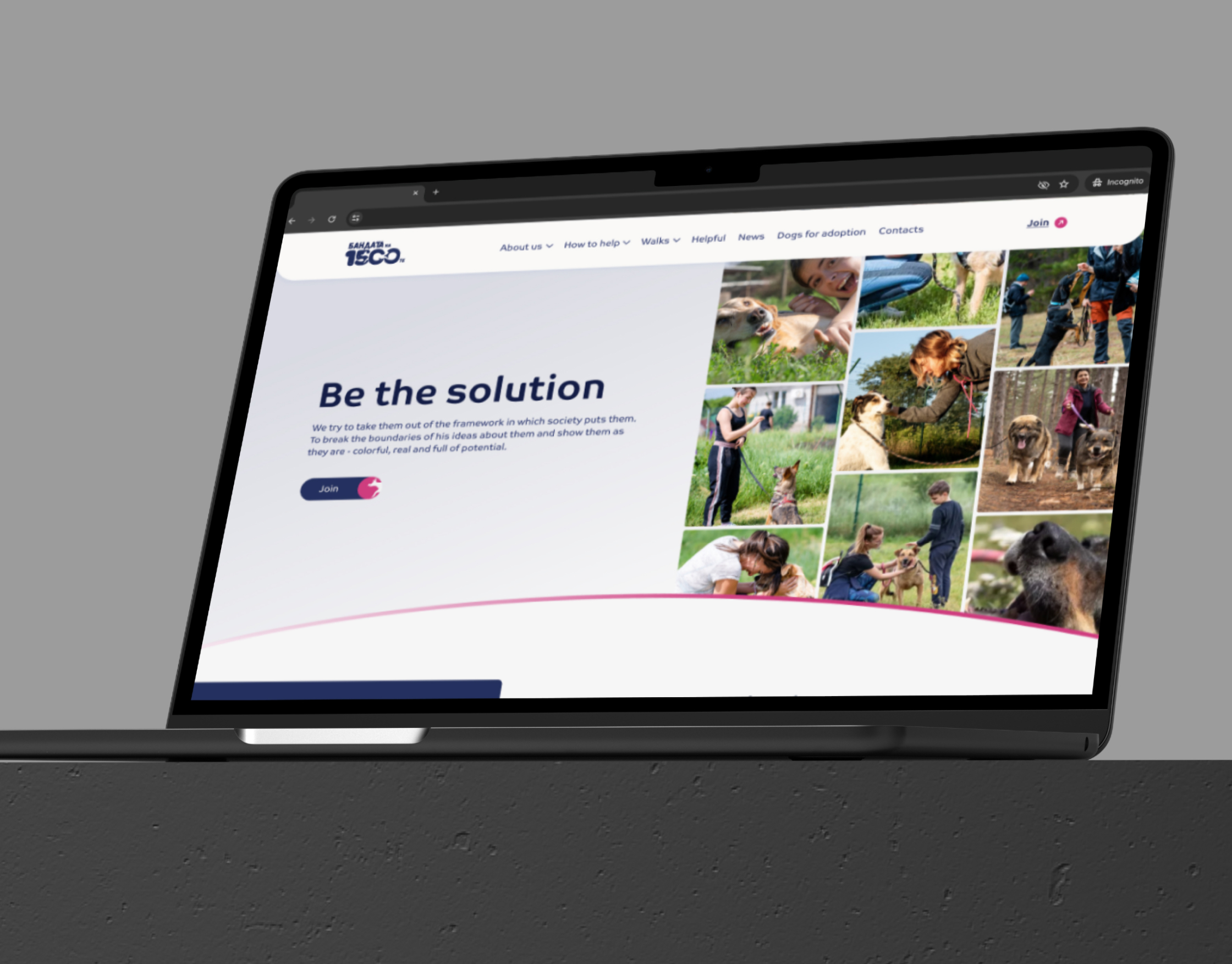 1500 Dog Gang homepage on an angled laptop mockup, showing the Be the solution hero and dog photo grid