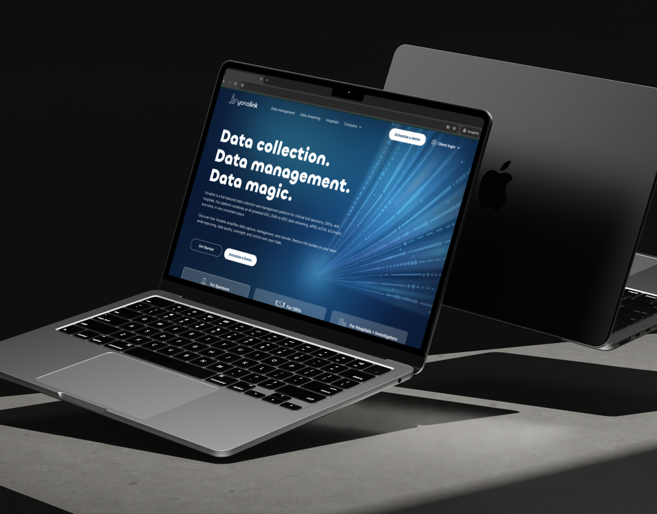 Yonalink homepage on a laptop in a dark studio setting, showing the Data collection, management and magic hero