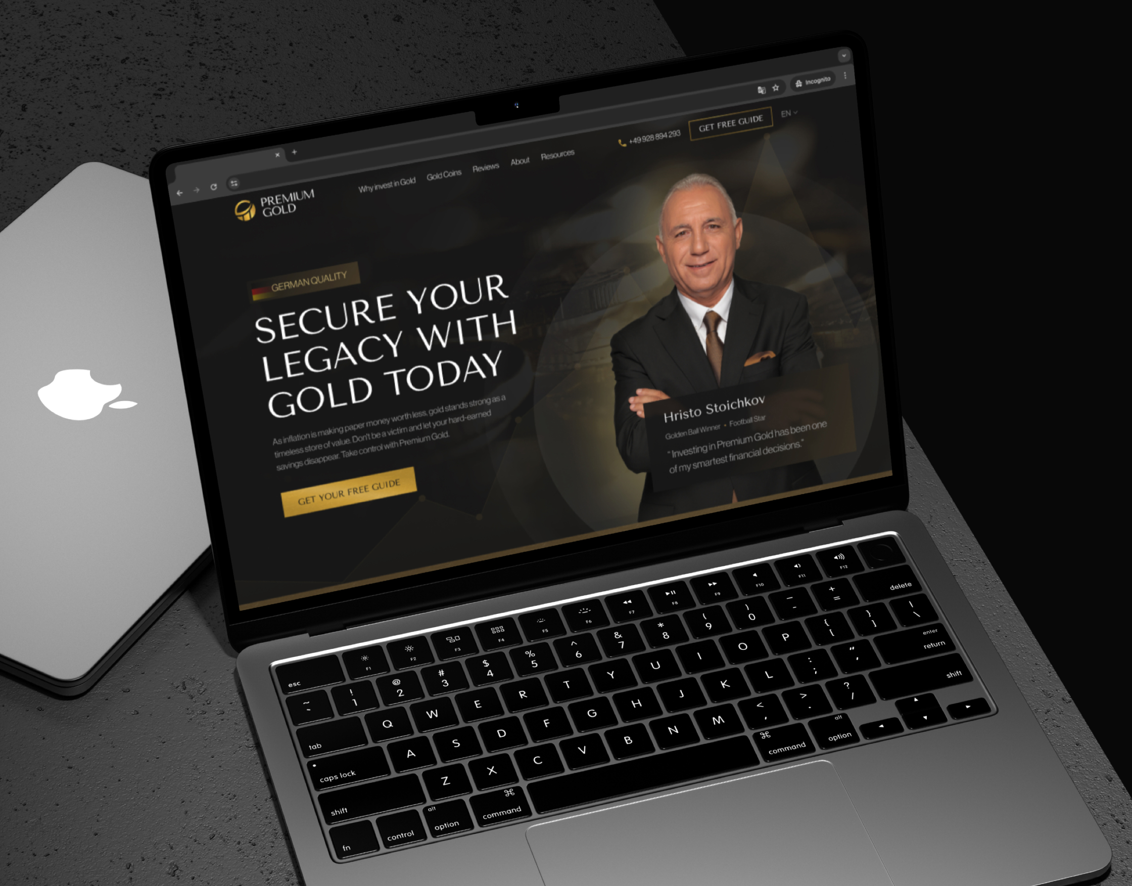 Premium Gold homepage on a laptop mockup, showing the dark hero and the Get Your Free Guide button