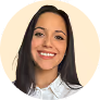 A smiling woman in a white shirt.