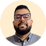 A man with glasses and a beard in a circle.