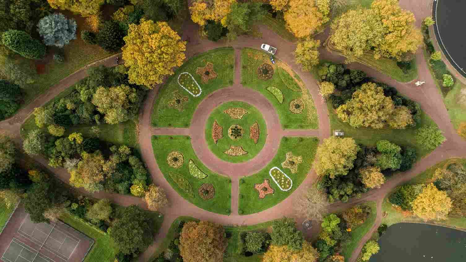 aerial view of a circular garden and driveway