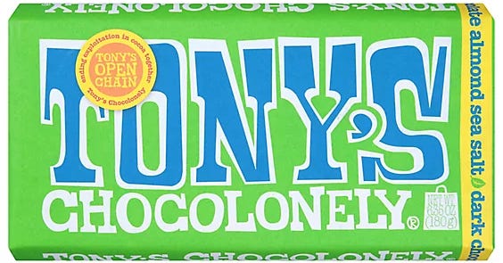 The green & blue wrapper to a chocolate bar that has a label stating "Tony's Open Chain" and "Ending exploitation in cocoa"