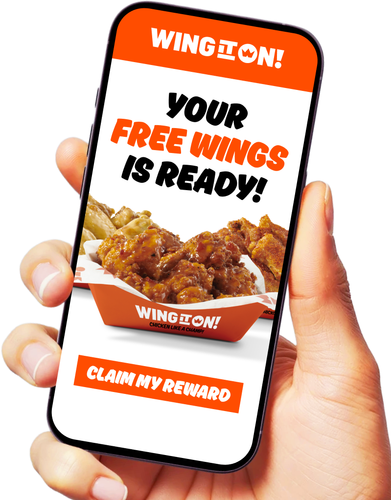 Hand holding a phone showing the Wing It On! app with a "Your free wings is ready" reward screen