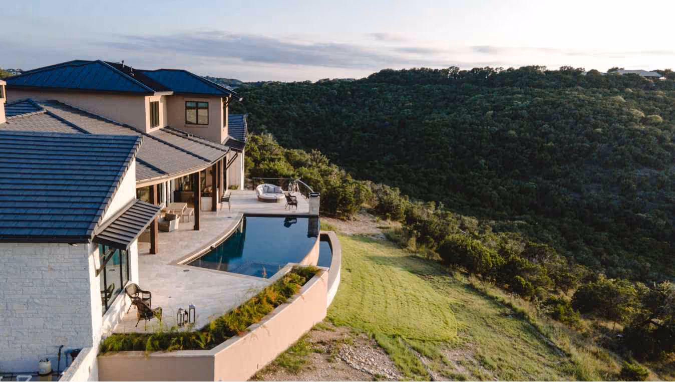 Photo of a beautiful custom home by John Simering Homes overlooking the Texas hill-country