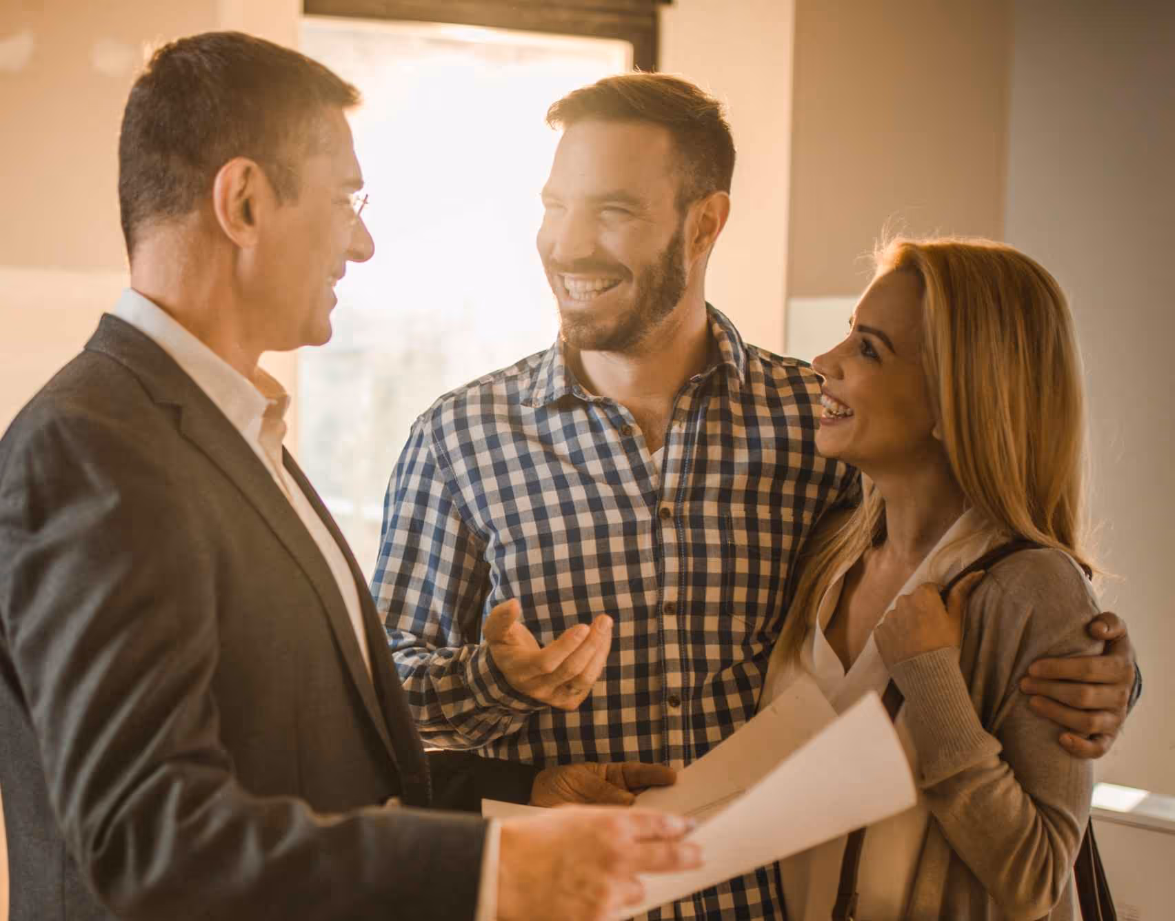 Photo of a couple enjoying their custom home discussion with John Simering, Texas custom homebuilder