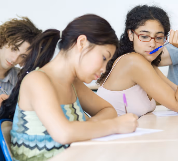 young students doing their homework