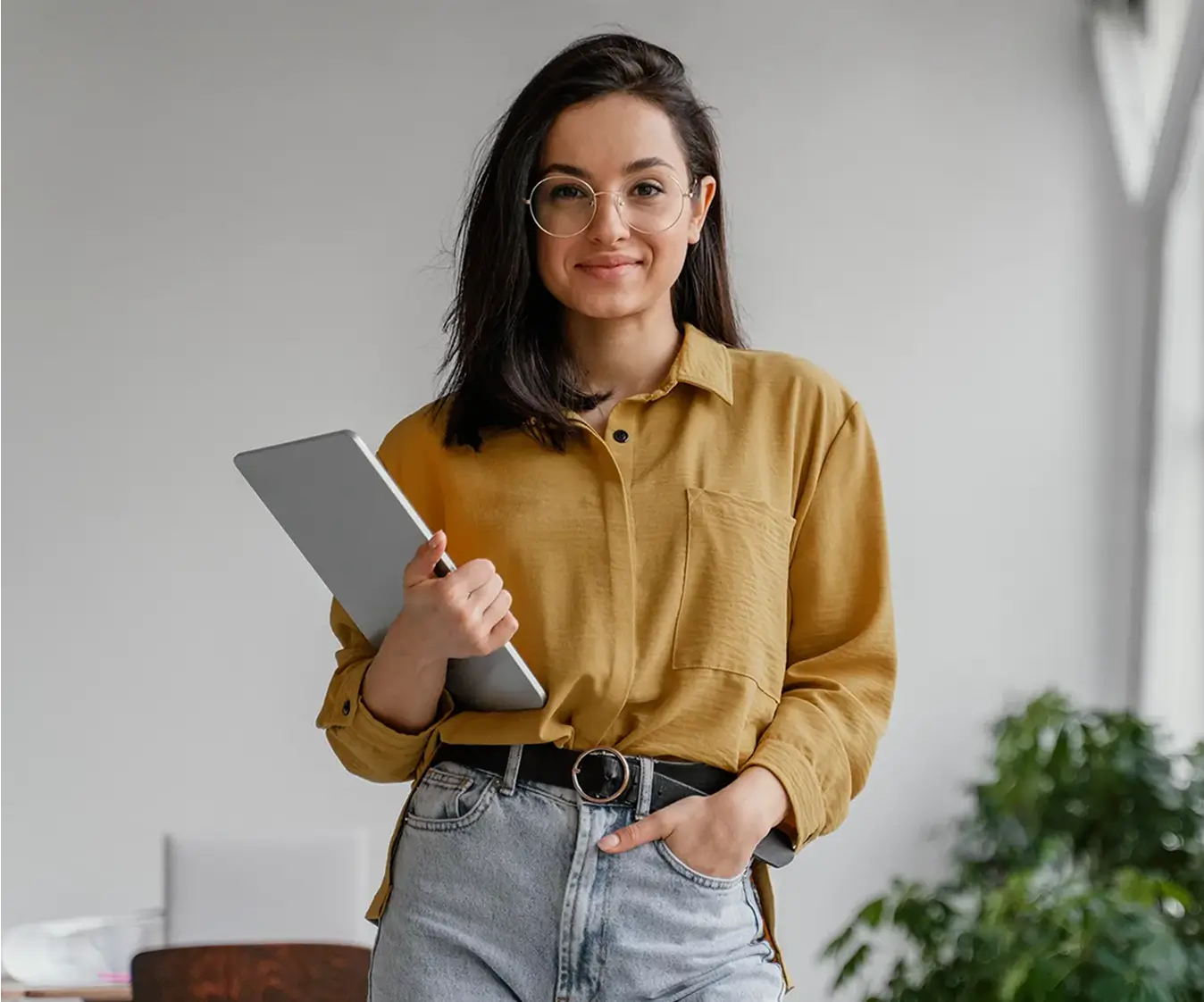 Young woman holding tablet ready to consult about AI.