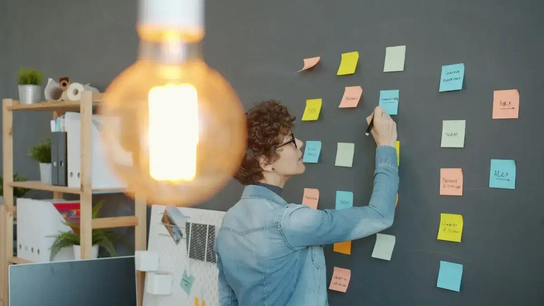 Female entrepreneur hard at work improving her company's product
