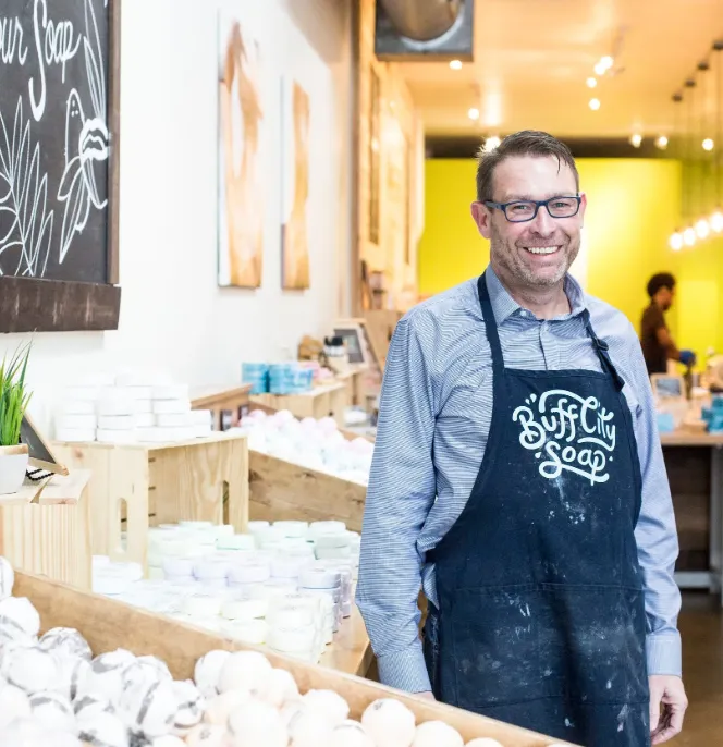 Commerçant d'une boutique de la société Buff City Soap, du portefeuille du gérant de Private Equity General Atlantic
