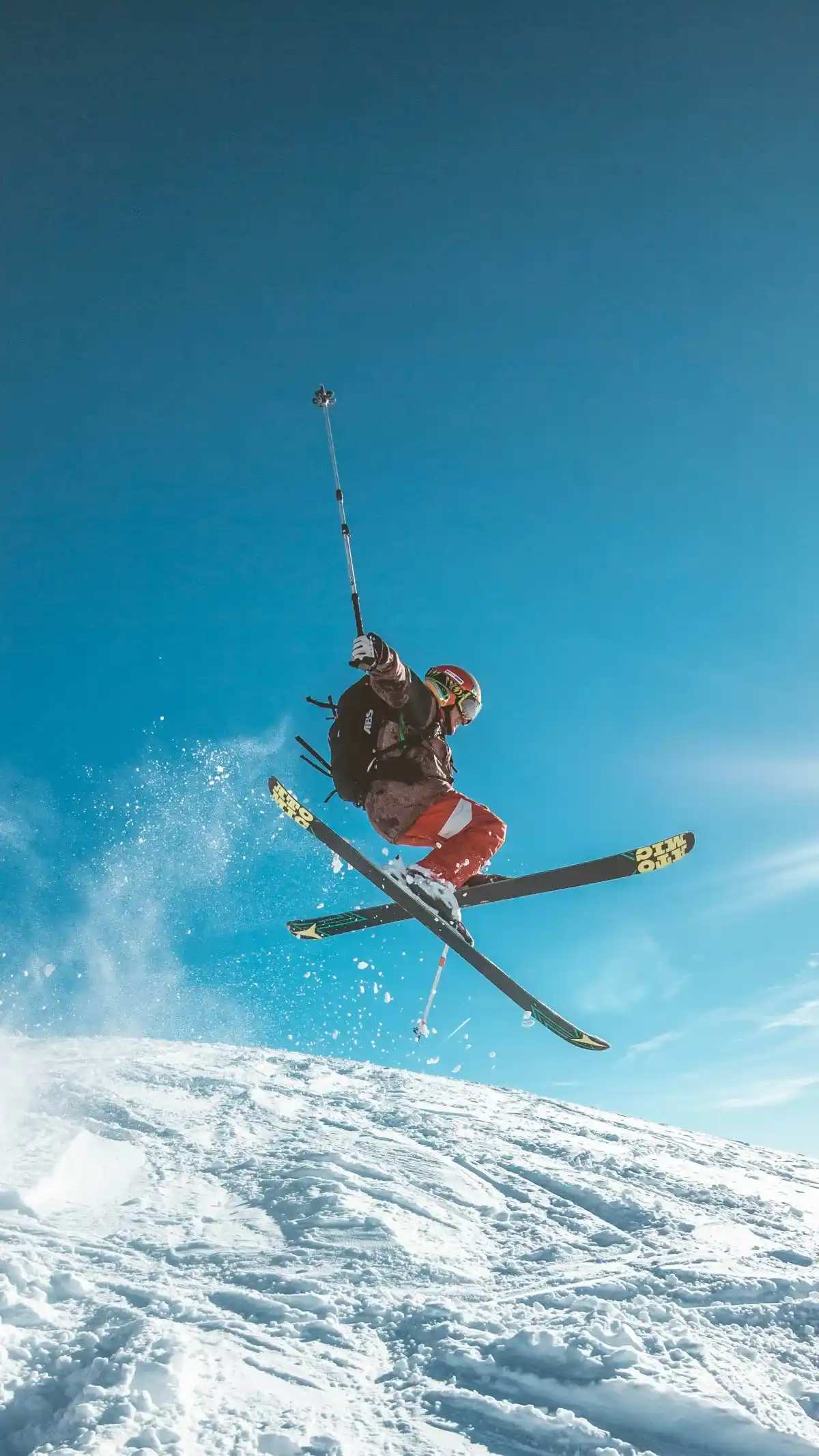 Skieur réalisant un saut en montagne, évocation de la performance et de sa mesure en Private Equity