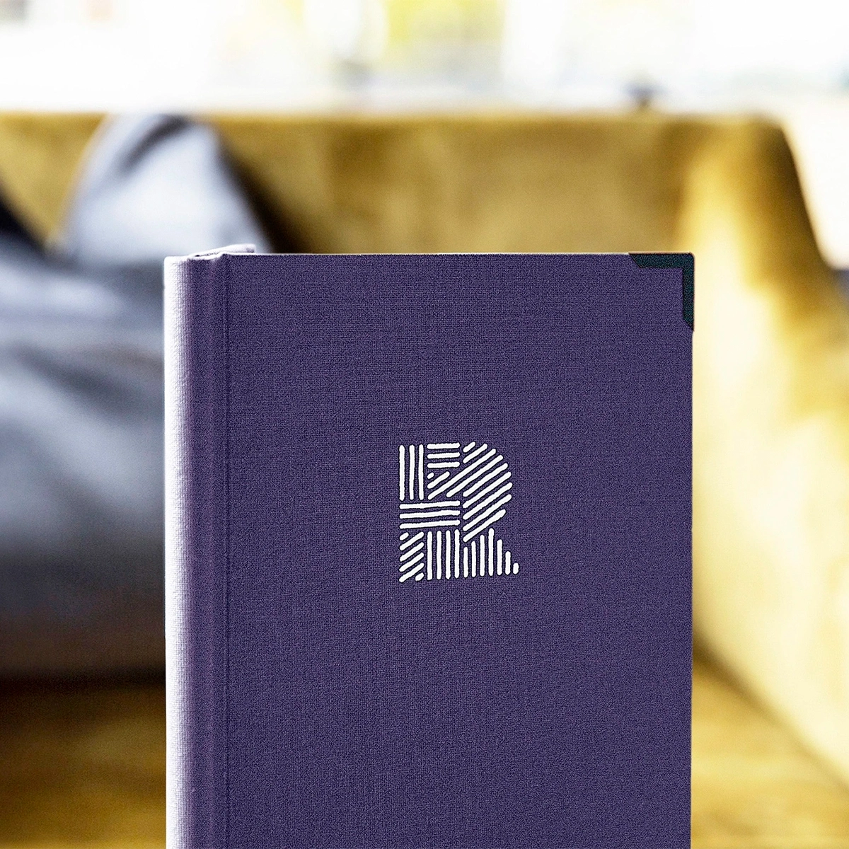 An acronym brand name uses initial letters for recognition and ease, like Familux Resorts with F and R.