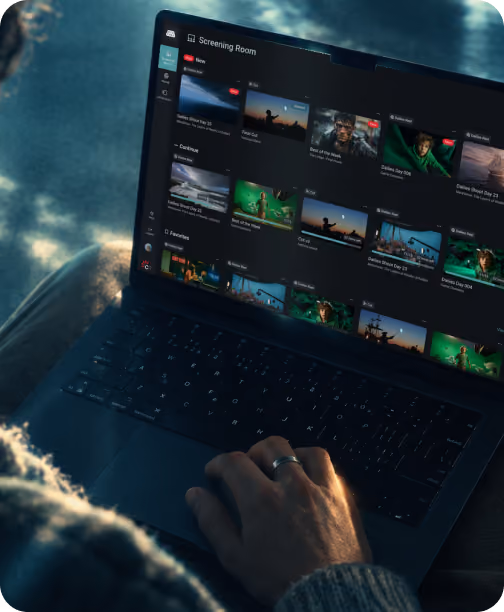 Editor reviewing footage on dual monitors in a post-production suite