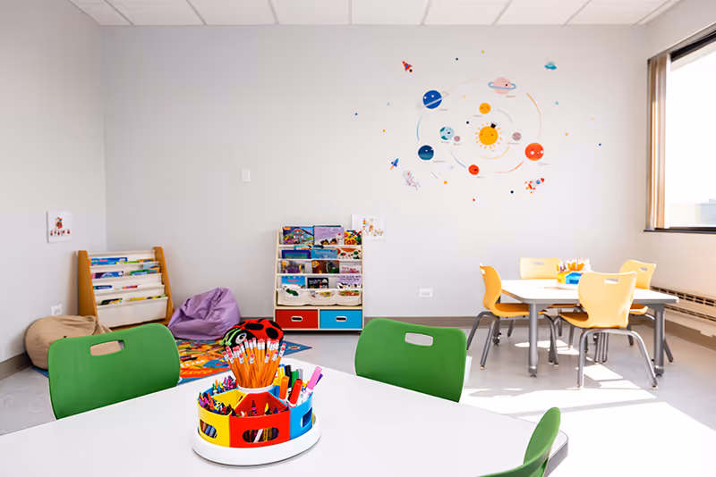 Therapy room with educational toys and games at North Shore Pediatric Therapy, Naperville, IL