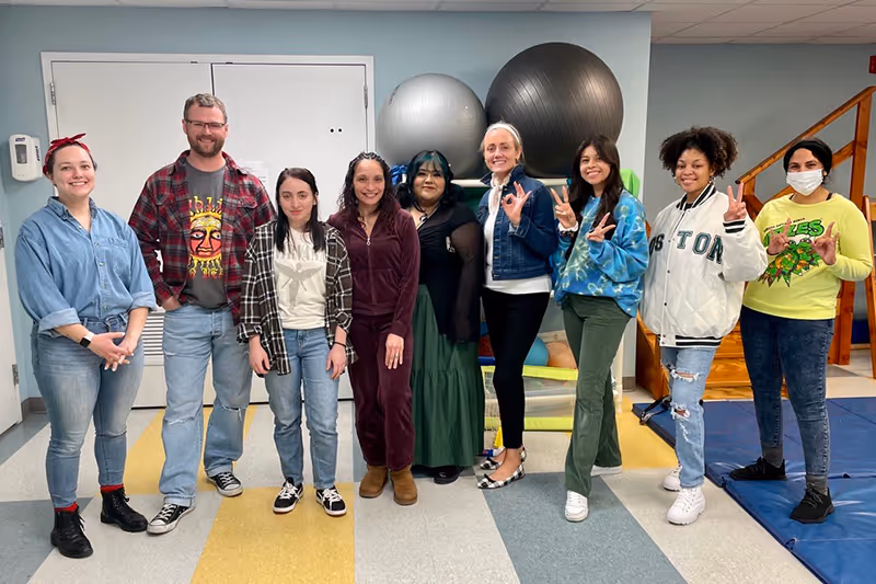 The energetic and enthusiastic Lake Bluff ABA therapy team on spirit week day, dressed in their finest costumes and showing off their spirited personalities