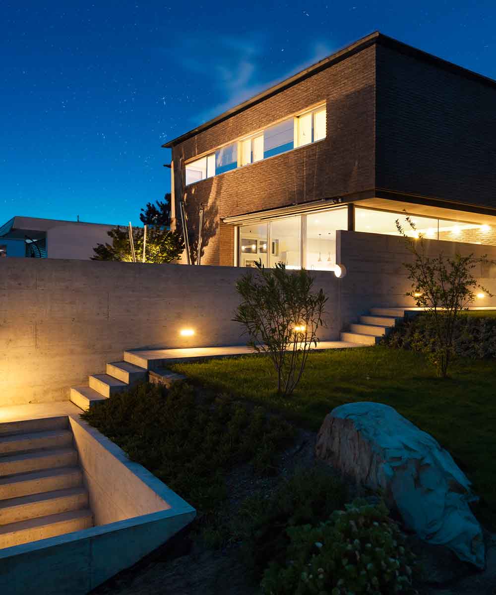 Luxury home with smart lighting at night