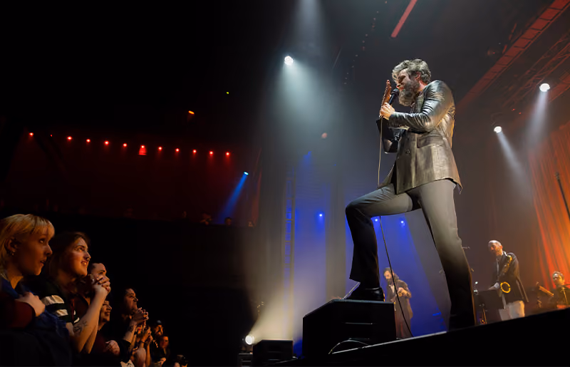 A crowd at a concert recording on their phones