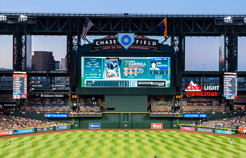 The scoreboard and fans in the stands at Chase Field