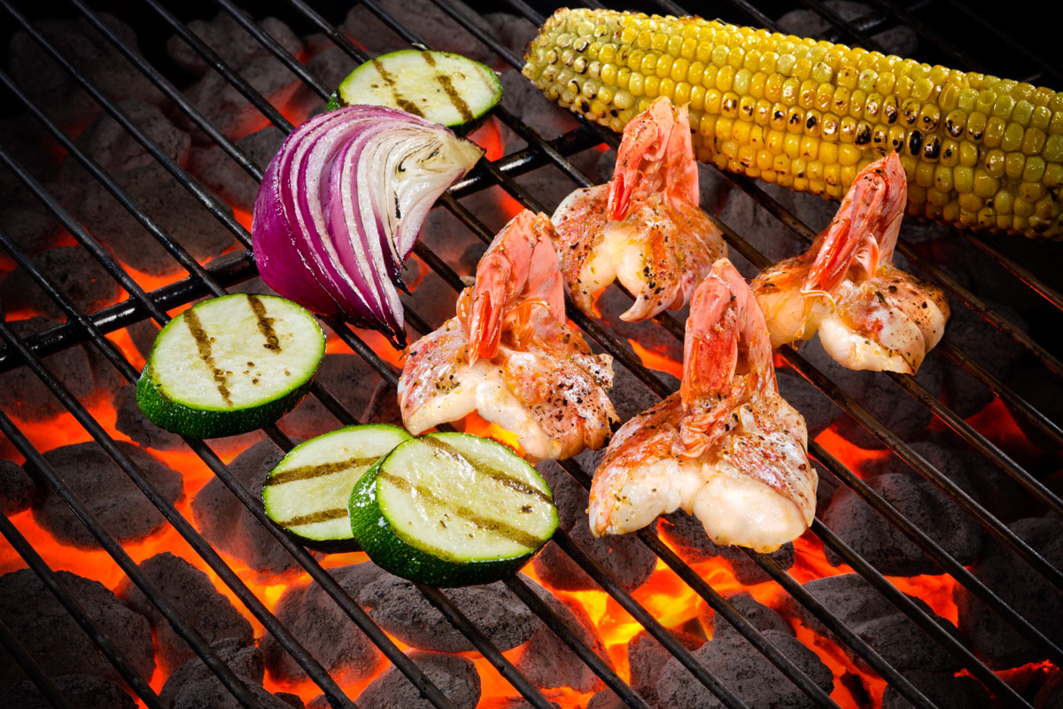 BBQ Bay Skewers White Shrimp grilling over open flame