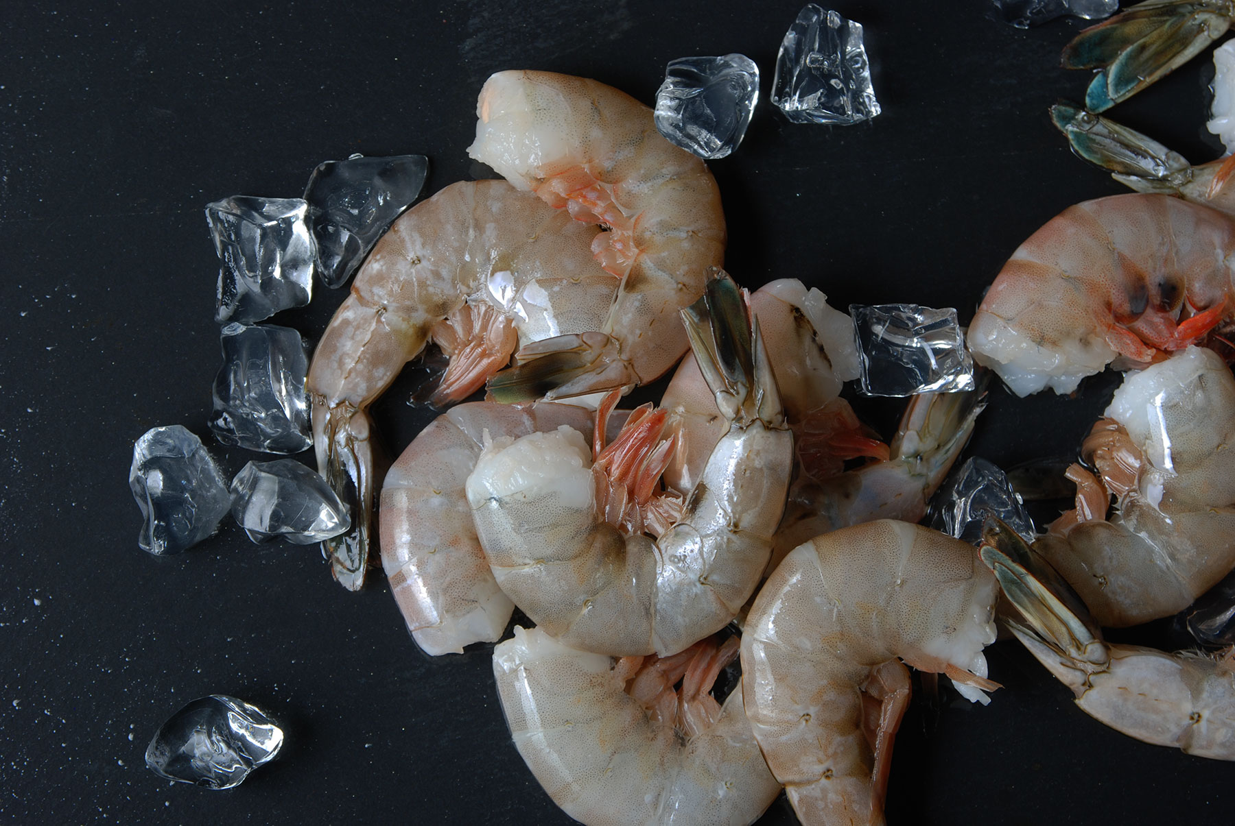 Raw wild Mexican shrimp, headless shell-on, on ice
