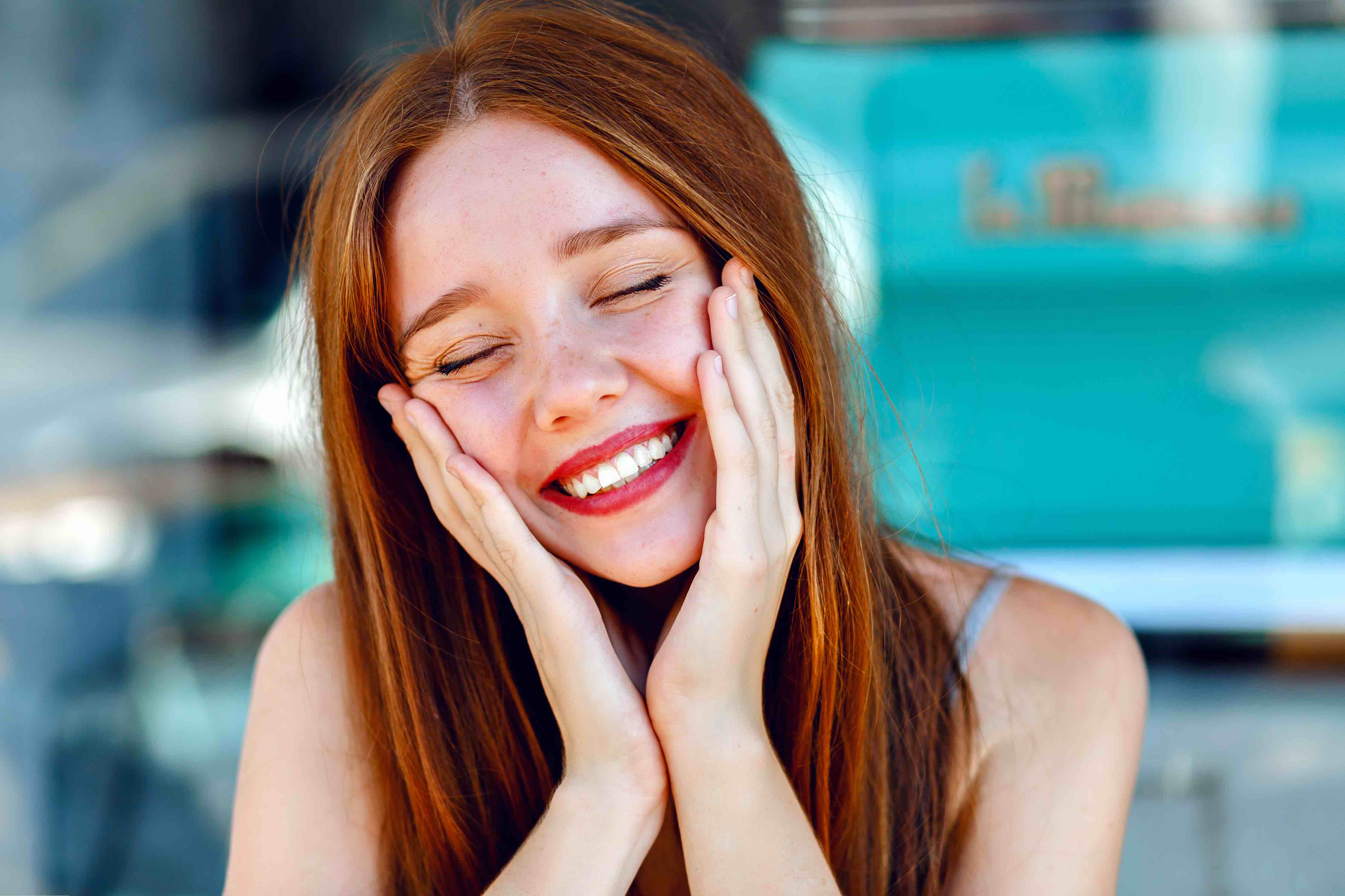 Girl with red hair and a beautiful smile 