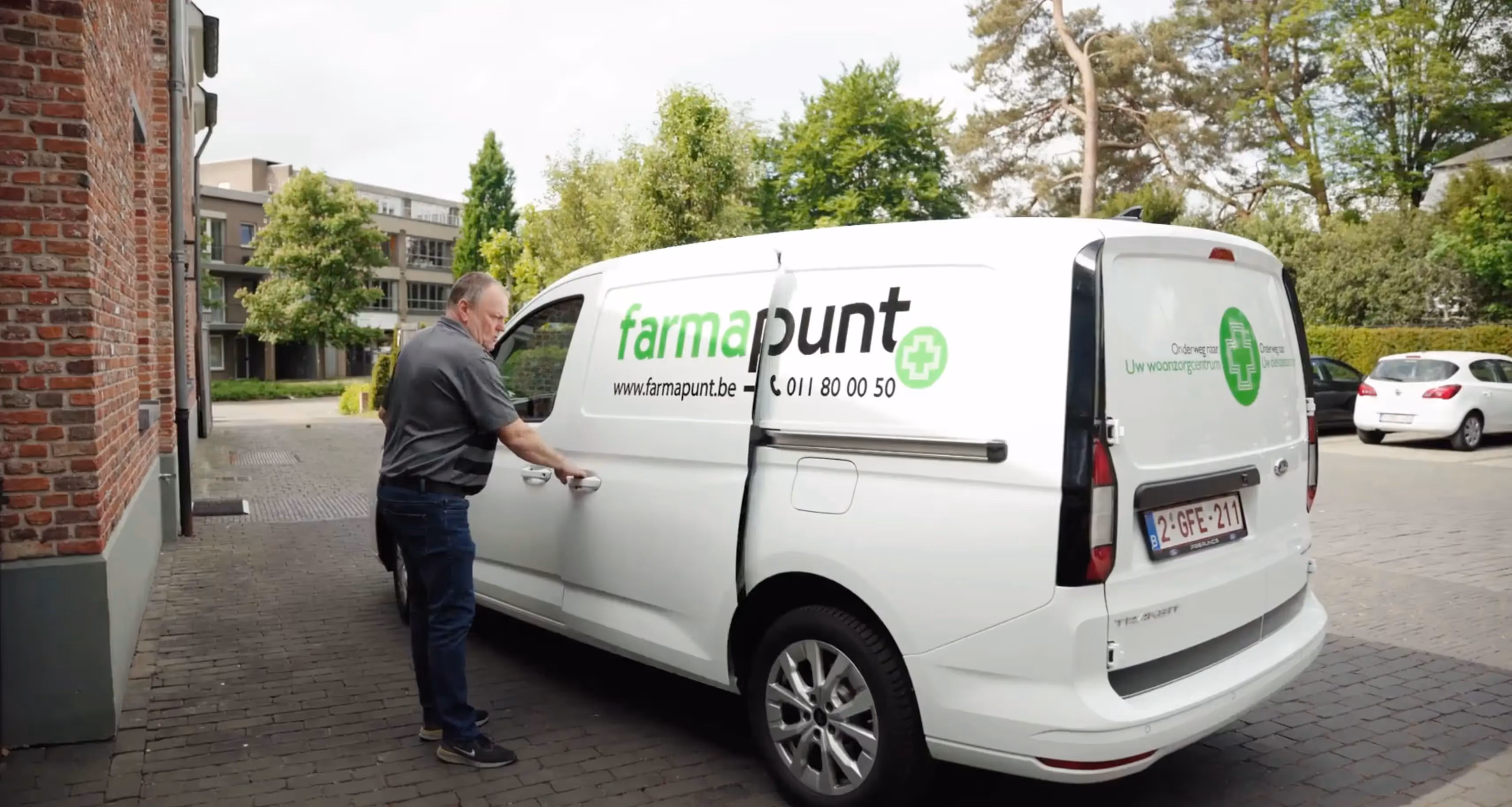 Delivery van used for daily distribution of completed medication orders.