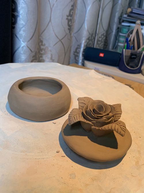 A ceramic sculpture of a flower jewelry box I made while in Korea.