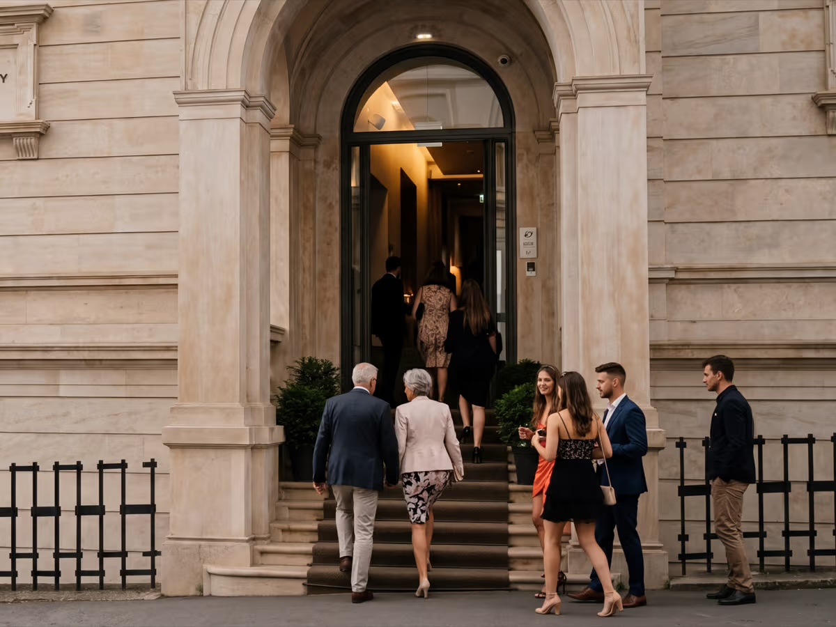 Guests enter the Aranybástya through the arched entrance of the Lónyay-Hatvany