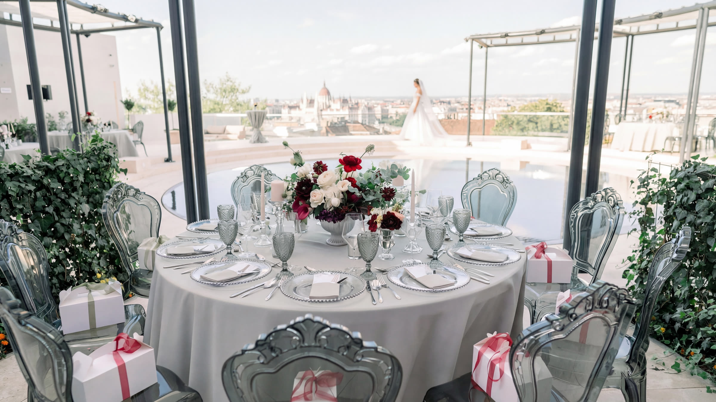 Wedding table setting on the terrace with a panoramic view, with the Budapest skyline in the background